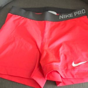 Hot coral/pink Nike pro shorts